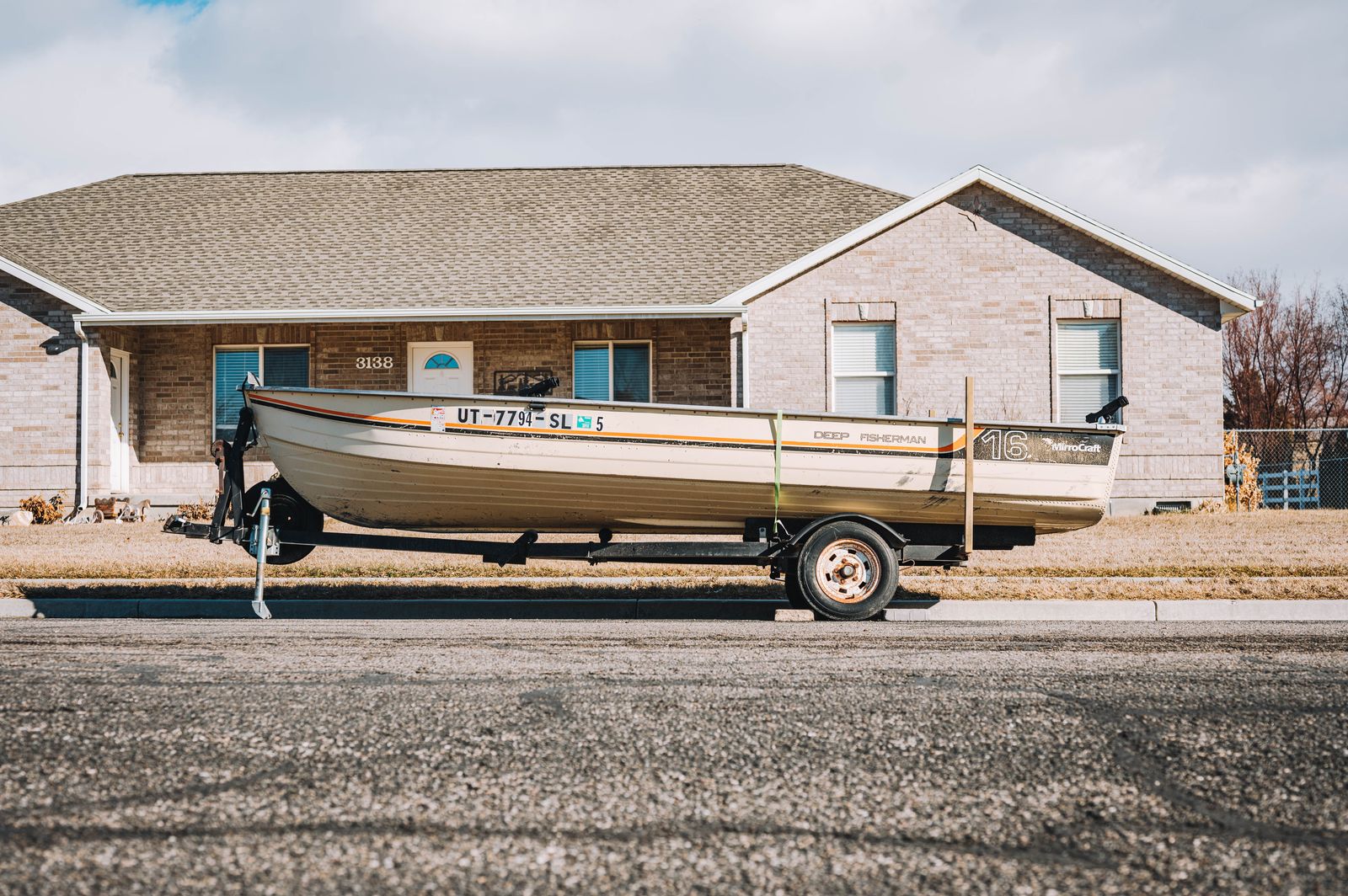 Fishing boat on a single-axle trailer